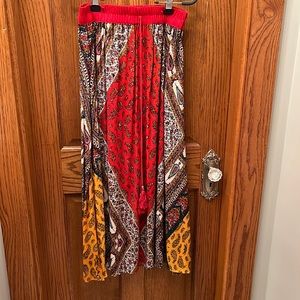 Long Boho multi colored skirt with elasticize waist. Decorative drawstring.